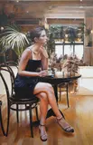 Café scene with seated woman by Rob Hefferan, oil on canvas, sold Jun 2024