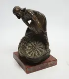 On rouge marble base by Rudolf Marcuse, bronze, sold Jun 2024
