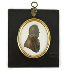 Silhouette of a gentlemanpainted and bronzed plasterlooking to sinister by John Miers, sculpture, sold Jun 2024