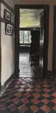 Moseley Old Hall, View through a doorway by Matthew Wood, gouache on board, sold Nov 2024