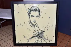 Elvis with camera by Craig Alan, oil on board, sold Jan 2022