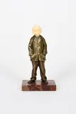 Girl in a trouser suit patinated bronze and ivory on red veined by Solange Bertrand, bronze and ivory, offered Oct 2021