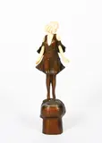 Champagne Girl by Otto Poertzel, bronze and ivory, sold Oct 2021