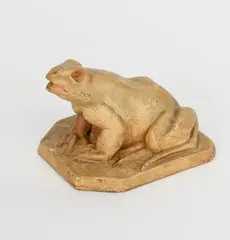 Frog a patinated plaster figure and a collection of five plaques by Donald Gilbert, sculpture, sold Aug 2021