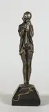 The little sad one by Dimiter Chiparus, Epreuve en bronze à patine vieil argent réhaussé de polychromie, sold Dec 2017