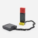 Enorme telephone by Ettore Sottsass, 1986, plastic, rubber, printed packaging, sold Jan 2023