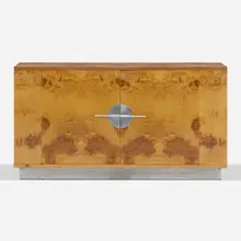 Cabinet by Walter Dorwin Teague, c. 1935, paldao burl, lacquered wood, brushed steel, sold Jan 2023