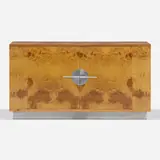 Cabinet by Walter Dorwin Teague, c. 1935, paldao burl, lacquered wood, brushed steel, sold Jan 2023