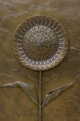 Abstract sunflower by Giovanni Schoeman, bronze, sold May 2024