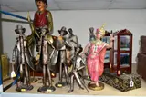 comprising a resin? golfer on wooden plinth, height approximately 68cm ( by Decorative Sculptures Etc, sculpture, sold Oct 2021