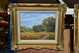 A British country landscape with woodlands to the mid by Lesley Hammett, oil on board, sold Oct 2021