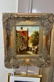 a nostalgic Dutch street scene with figures, signed by Pieter Cornelis Steenhouwer, oil on board, sold Oct 2021