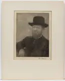 MENNONITE / PENNSYLVANIA DUTCH PREACHER PHOTOGRAPHIC PORTRAIT by Doris Ulmann, oil pigment print on tissue paper depicting a bearded man wearing a black hat and coat, sold Jun 2024