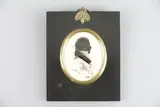 Profil d'homme en silhouette by Hinton Gibbs, Gouache sous verre bombé Marqué, sold Apr 2023