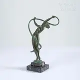 sous le pseudonyme de DENIS et Max LE VERRIER (1891-1973) Danseuse au ruban by Marcel-André Bouraine, Epreuve en alliage de bronze patiné vert sur une base à gradins en marbre veiné, sold Feb 2024