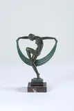 sous le pseudonyme de DENIS et Max LE VERRIER (1891-1973) Danseuse au voile by Marcel-André Bouraine, Epreuve en alliage de bronze patiné vert et onyx sur une base à gradin en marbre veiné, sold Feb 2024