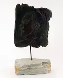 Portrait d'un homme by Alice Winant, Bronze sur base en pierre, sold Aug 2023