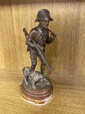 Chasseur accompagné de son chien by Alfred Dubucand, Épreuve en bronze à patine brune, sold Dec 2021