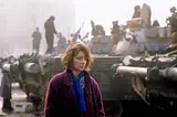 Jeune roumaine sur le place de la République, révolution roumaine by José Nicolas, 1989, Tirage couleur lambda, légendé et signé au dos par le photographe, sold Feb 2025