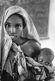 Somalienne, mère à l’enfant, dans un dispensaire de Médecin sans Frontière by José Nicolas, 1992, Tirage argentique d’époque, légendé et signé au dos par le photographe, sold Feb 2025