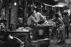 Le marché à Hanoï, Vietnam by José Nicolas, 1993, Tirage argentique, légendé et signé au dos par le photographe, sold Feb 2025
