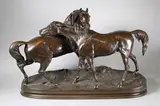 L'accolade by Pierre-Jules Mêne, Epreuve en bronze à patine brun nuancé rouge, sold Oct 2017