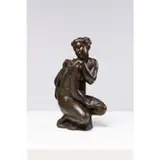 Femme accroupie tenant une draperie sur l’épaule droite by Richard Guino, Bronze à patine mordoré, sold Mar 2023
