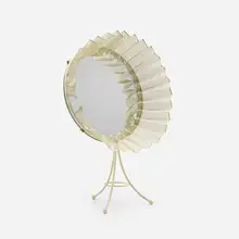 Table mirror by Mathieu Matégot, c. 1950, enameled and perforated steel, mirrored glass, sold Jan 2023