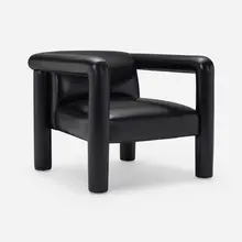 Armchair by Modern, c. 1980, leather, sold Jan 2023
