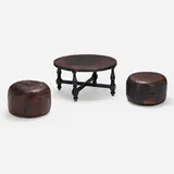 Occasional table and stools, pair by Angel Pazmiño, c. 1965, embossed saddle leather, stained hardwood, sold Jan 2023