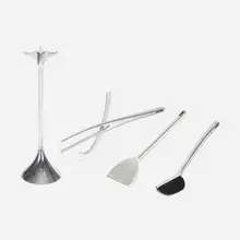 Fuego fireplace set by Umbra, 1980, cast aluminum, horsehair, sold Jan 2023