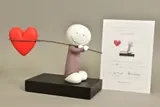 Caught up in love by Doug Hyde, sculpture, sold Jul 2021