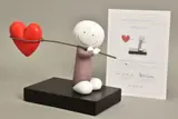 Caught in love by Doug Hyde, sculpture, sold May 2021