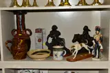 to include a porcelain soldier, with pseudo gold anchor to base, by Nine Ornament And Pottery Items, bronze, offered May 2021