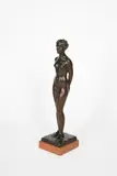 Standing female nude patinated bronze on red marble base by Gustave Adolf Daumiller, bronze, sold Oct 2020