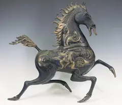 Fingerhut by Jiang Tiefeng, Bronze sculpture of a trotting horse decorated with surreal figures, sold Sep 2023
