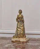 La Liseuse by René Paul Marquet, Bronze doré, sur une base en marbre veiné, sold Feb 2023
