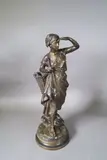 La pêcheuse à pieds by Eugène Laurent, Epreuve en bronze patinée signée sur la terrasse, sold Sep 2024