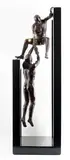 Solidarité by Juan Carlos Delgado, Bronze à patine brune et cadre de bois/verre Provenance: Collection de M, sold Feb 2023