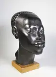 Tête de Jeune Africaine by Riccardo Scarpa, Terre cuite à patine noire, sold Nov 2016