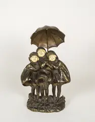 Three Children with Umbrella by Demeter H. Chipăruş, bronze and ivory sculpture, sold Apr 2023