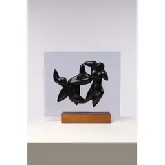 Les trois nus by Man Ray, 1971, Bois d'ébène teinté monté sur Plexiglas, sold Oct 2023