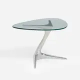Unicorn occasional table by Vladimir Kagan, cast and polished aluminum, glass, sold Jan 2023