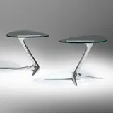 Unicorn occasional tables, pair by Vladimir Kagan, cast and polished aluminum, glass, sold Jan 2023