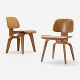 DCWs, pair by Charles and Ray Eames, walnut plywood, rubber, sold Jan 2023