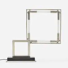 Table lamp by Jacques Adnet, c. 1970, aluminum, painted wood, sold Jan 2023