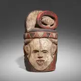 Three-faced helmet mask by Igbo, carved and painted wood, sold Jan 2023