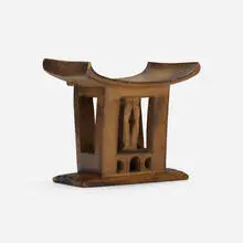 Prestige stool by Asante, carved wood, sold Jan 2023