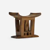 Prestige stool by Asante, carved wood, sold Jan 2023