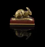 A gilt bronze model of a crouching rabbit by Antoine-Louis Barye, BRONZE, sold Jun 2023